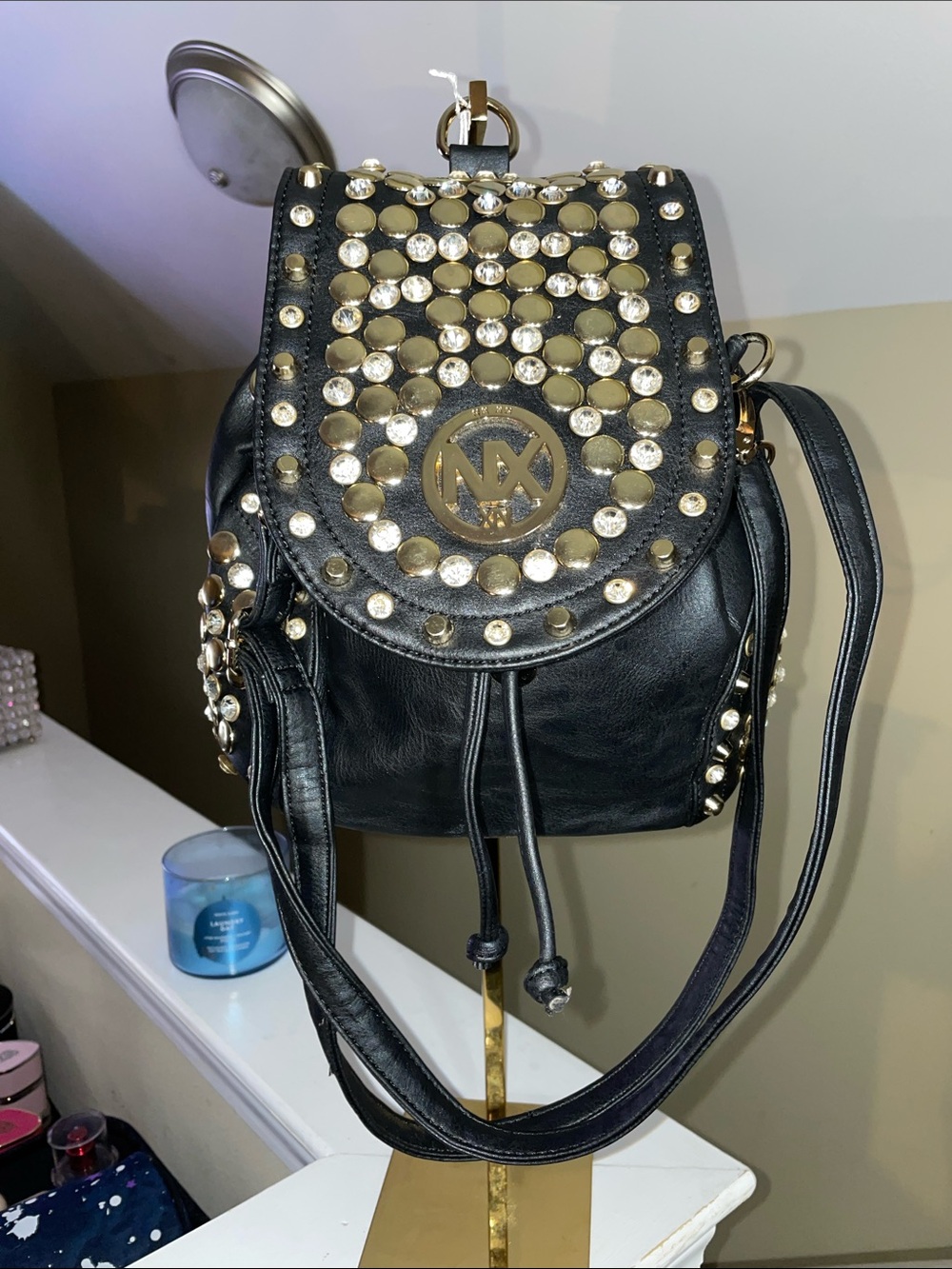 MK Embellished Black Leather Mini Backpack and crossbody with Gold Accents